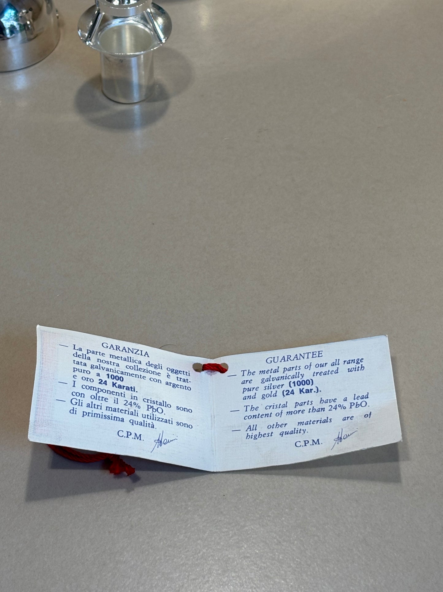 DISPENSADOR DE AZUCAR EN PLATA.