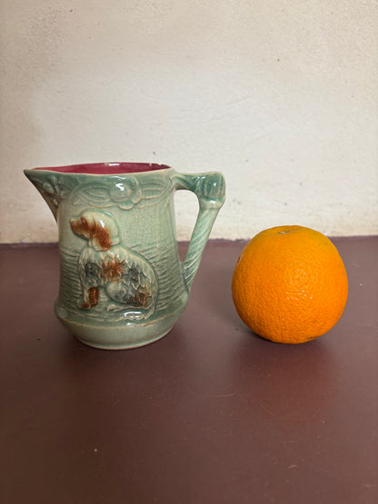 PEQUEÑA JARRA ANTIGUA EN BARBOTINE.