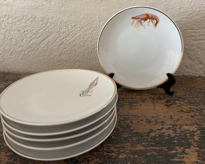 PLATOS DE PAN VINTAGE CON DIBUJOS DE MARISCOS.