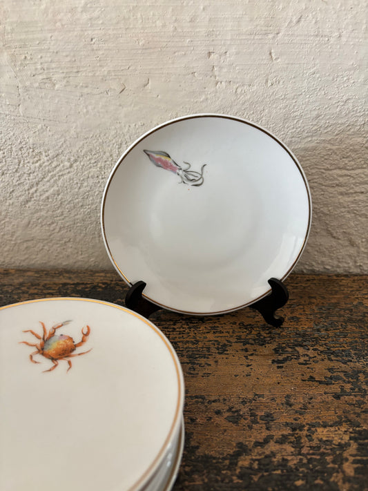 PLATOS DE PAN VINTAGE CON DIBUJOS DE MARISCOS.