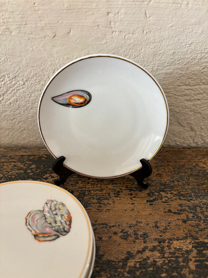 PLATOS DE PAN VINTAGE CON DIBUJOS DE MARISCOS.