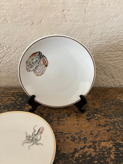 PLATOS DE PAN VINTAGE CON DIBUJOS DE MARISCOS.